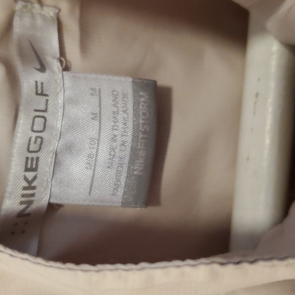Nike golf windbreaker size medium. Color tan with white contour under arm area. - Picture 2 of 5